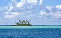 Beautiful unoccupied Paradise island in the blue lagoon in French Polynesia. Royalty Free Stock Photo