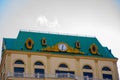 Beautiful and unusual clock on the roof of the building in the city of Batumi