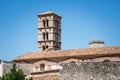 Bell tower of the cathedral `Santa Maria Assunta` of the XII century in the historical center of Sermoneta. Italy Royalty Free Stock Photo