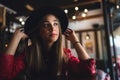 Portrait of beautiful urban girl out in the cafe club. Modern youth culture. Royalty Free Stock Photo