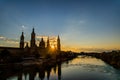 Urban sunset over the Pilar cathedral in Zaragoza, spain and the Ebro river Royalty Free Stock Photo