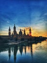 Urban sunset over the Pilar cathedral in Zaragoza, spain and the Ebro river Royalty Free Stock Photo