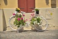 Beautiful urban white bike decorated with flowers Royalty Free Stock Photo