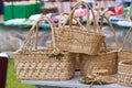 Beautiful, useful and fashionable straw bags and hat on sale, traditional European folk craft art Royalty Free Stock Photo