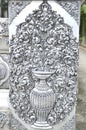 The beautiful vase of flower silver relief at the silver temple