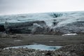 Beautiful Vatnajokul glacier with tiny people silhouettes