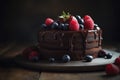 A beautiful vegan chocolate cake layered with rich ganache and adorned with colorful berries.Â 
