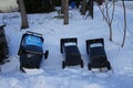 Garbage bins falling on the snow. Berlin, Germany