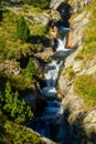 Beautiful veil cascading waterfall, mossy rocks in Pyrenees in Spain Royalty Free Stock Photo