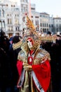 Beautiful Venetian masked model from the Venice Carnival 2019