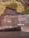 beautiful vertical garden and mural of positive words in the Spanish city of Malaga on a summer day