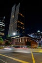 Beautiful vertical shot of a city in light at nighttime