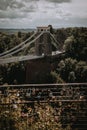 Beautiful vertical shot of Clifton suspension bridge over the River Avon in Bristol, United Kingdom. Royalty Free Stock Photo