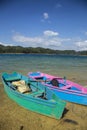 Beautiful vertical shot of the dinghy boats parked near the Montebello lake in Chiapas, Mexico