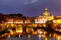 Beautiful vibrant night image of St. Peter\'s Basilica, Ponte Sant Angelo and Tiber River at dusk in Rome, Italy Royalty Free Stock Photo