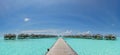 Beautiful panoramic photo of over water bungalows at Maldives Royalty Free Stock Photo