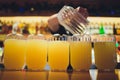 Beautiful vibrant picture of gold coloured beer glasses assortment, on wooden table, a summer sunny day, german Royalty Free Stock Photo