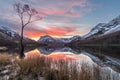 Beautiful Vibrant Pink And Orange Winter Sunrise At Buttermere In The Lake District, UK.