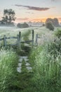 Beautiful vibrant Summer sunrise over English countryside landscape Royalty Free Stock Photo