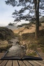 Beautiful vibrant sunrise landscape image of Blea Tarn in UK Lake District  coming out of pages in story book Royalty Free Stock Photo