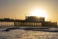 Beautiful vibrant sunrise landscape image of Worthing pier in West Sussex during Winter Royalty Free Stock Photo