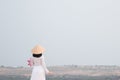 Beautiful Vietnamese holding Pink Lotus in White Sand dune Royalty Free Stock Photo