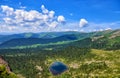 Beautiful view from above on lake and Siberian taiga