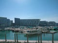 Beautiful view of Abu Dhabi city - Etihad towers and famous landmarks, Marina boats Royalty Free Stock Photo