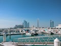 Beautiful view of Abu Dhabi city - Etihad towers and famous landmarks, Marina boats Royalty Free Stock Photo