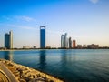 Beautiful view of Abu Dhabi city famous towers, buildings and beach Etihad towers