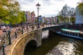 Beautiful view of Amsterdam canals with bridge and typical dutch houses. Holland Royalty Free Stock Photo