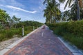 Beautiful view of architecture along Atlantic coastline from paving stones of red trail called Walking Street in Miami Beach. Royalty Free Stock Photo