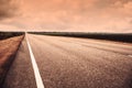 View of asphalt highway without transport. Orange tone Royalty Free Stock Photo