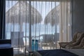 Beautiful view of Atlantic ocean through window of hotel room. Royalty Free Stock Photo