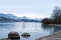 Beautiful view of autumn, winter Lucerne historic sites in switzerland, tourist boats on the picturesque shore of lake of Lucerne Royalty Free Stock Photo