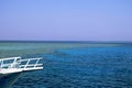 Beautiful view at azure Red Sea with a white yacht