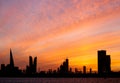 Beautiful orange yellow sky and Bahrain skyline at sunset Royalty Free Stock Photo