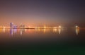 Bahrain skyline with mist during sunset