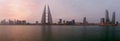 A beautiful view of Bahrain skyline during sunrise with BFH and WTC buildings