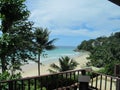 Beautiful view from the balcony of the hotel on the ocean, palm trees and the beach. Luxury resort Royalty Free Stock Photo