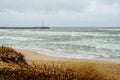 Beautiful view of the Baltic Sea shore line near Klaipeda city, Lithuania. Scenic sea coast on chilly autumn day Royalty Free Stock Photo