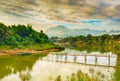 Beautiful view of a bamboo bridge. Laos landscape. Royalty Free Stock Photo