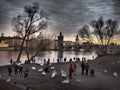 Beautiful view from the banks of the Vltava River to Prague, where the interesting background Charles Bridge