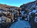 Barnafoss waterfall in a canyon near Hraunfossar cascades, HÃÂºsafell, west Iceland on sunny winter day with natural rock arch.
