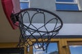 Beautiful view of basketball hoop with net in garden of house.