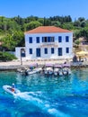 Beautiful view of the bay with boat and yacht and traditional house, Royalty Free Stock Photo