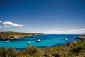 Beautiful view of the bay with turquoise water and yachts in Cala Mondrago National Park on Mallorca island Royalty Free Stock Photo