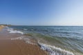 Beautiful view of beach in Mediterranean Sea with rolling waves of turquoise water. Beautiful summer nature backgrounds. Royalty Free Stock Photo