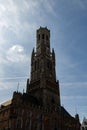 Beautiful view on the Belfry of Bruges - Backlight on the tower Royalty Free Stock Photo