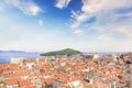 Beautiful view of the bell tower and the island Lokrum in the old town of Dubrovnik, Croatia Royalty Free Stock Photo